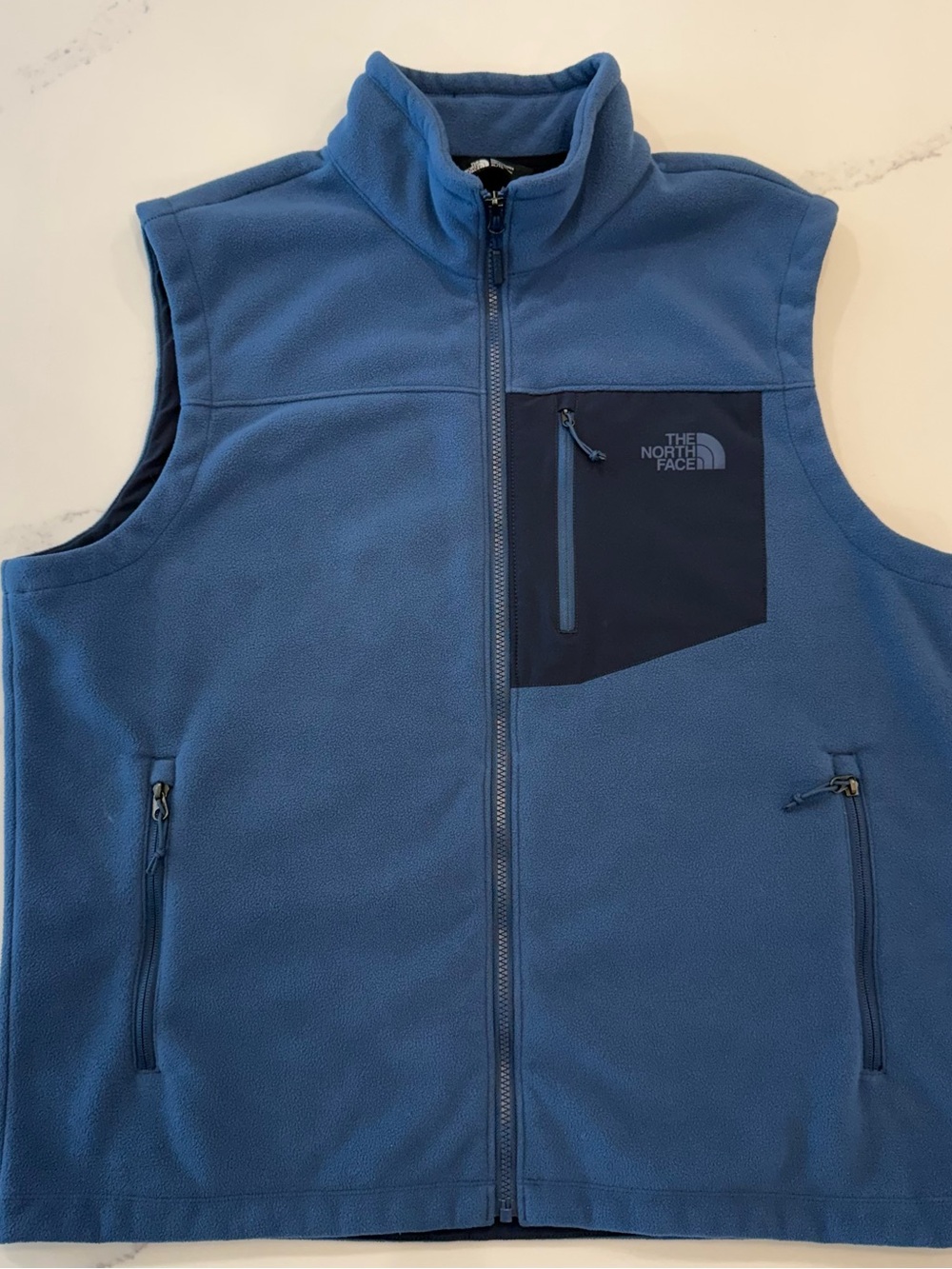 The North Face Blue Men’s Fleece Vest with Navy Chest Panel